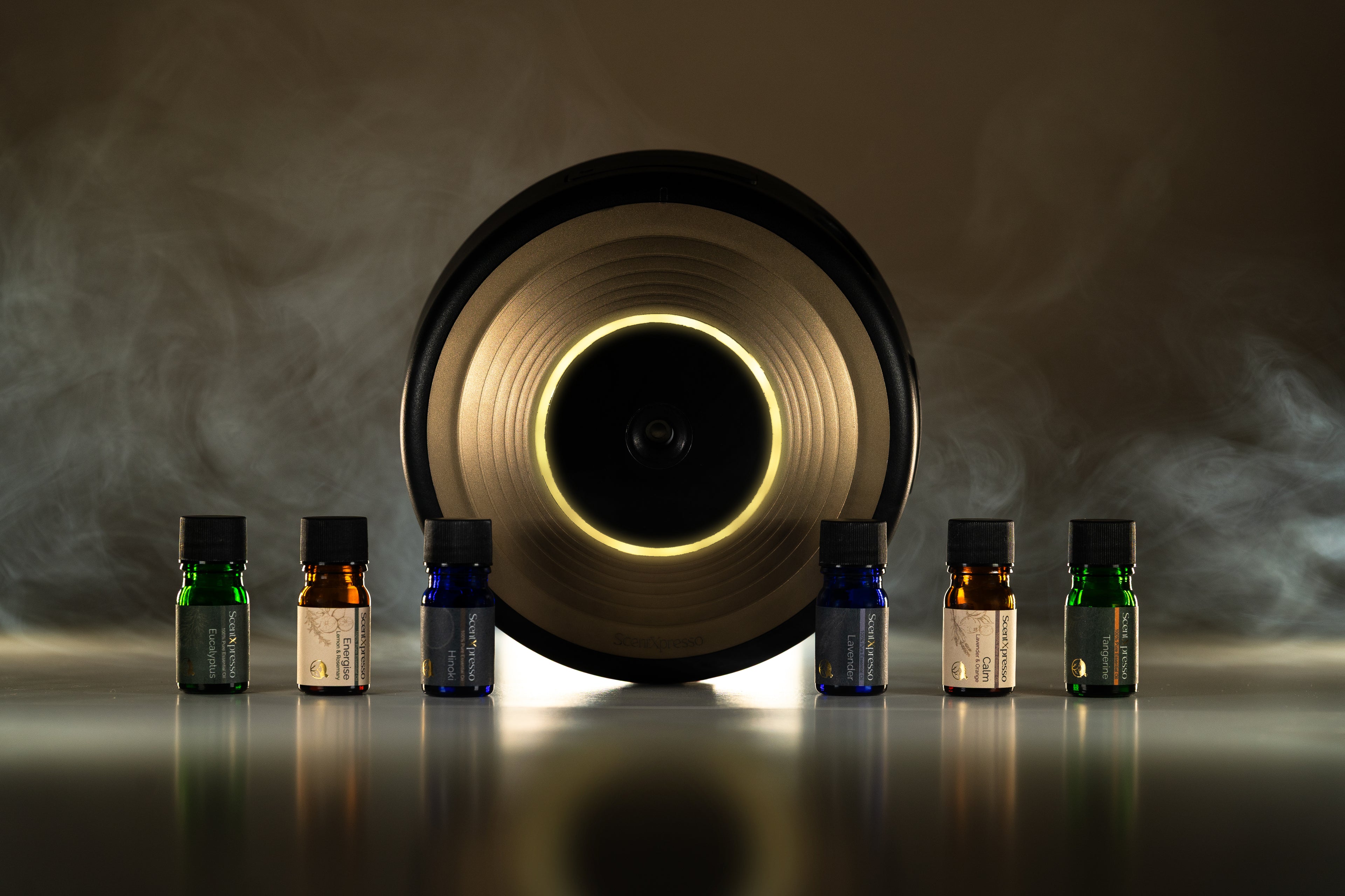 Image of Smart shower diffuser and 6 essential oil bottles